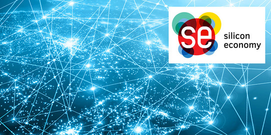 Silicon Economy Silicon Economy Logo mit leuchtendem Ausschnitt einer Weltkarte